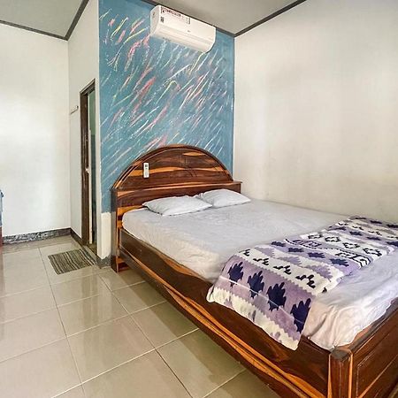 Ekas Beach Guesthouse Mitra Reddoorz Luaran gambar