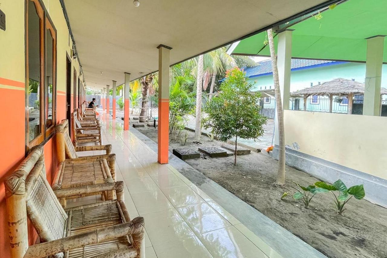 Ekas Beach Guesthouse Mitra Reddoorz Luaran gambar