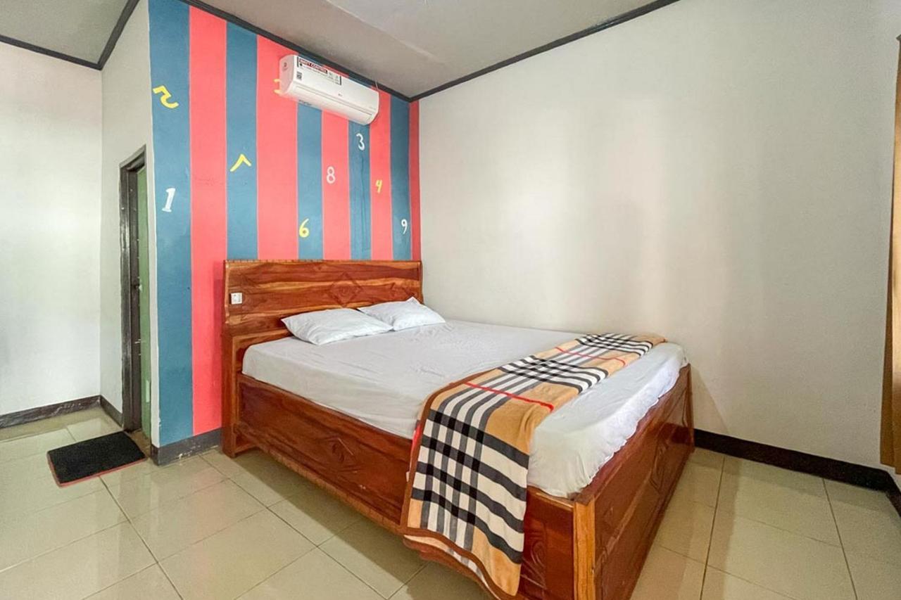 Ekas Beach Guesthouse Mitra Reddoorz Luaran gambar