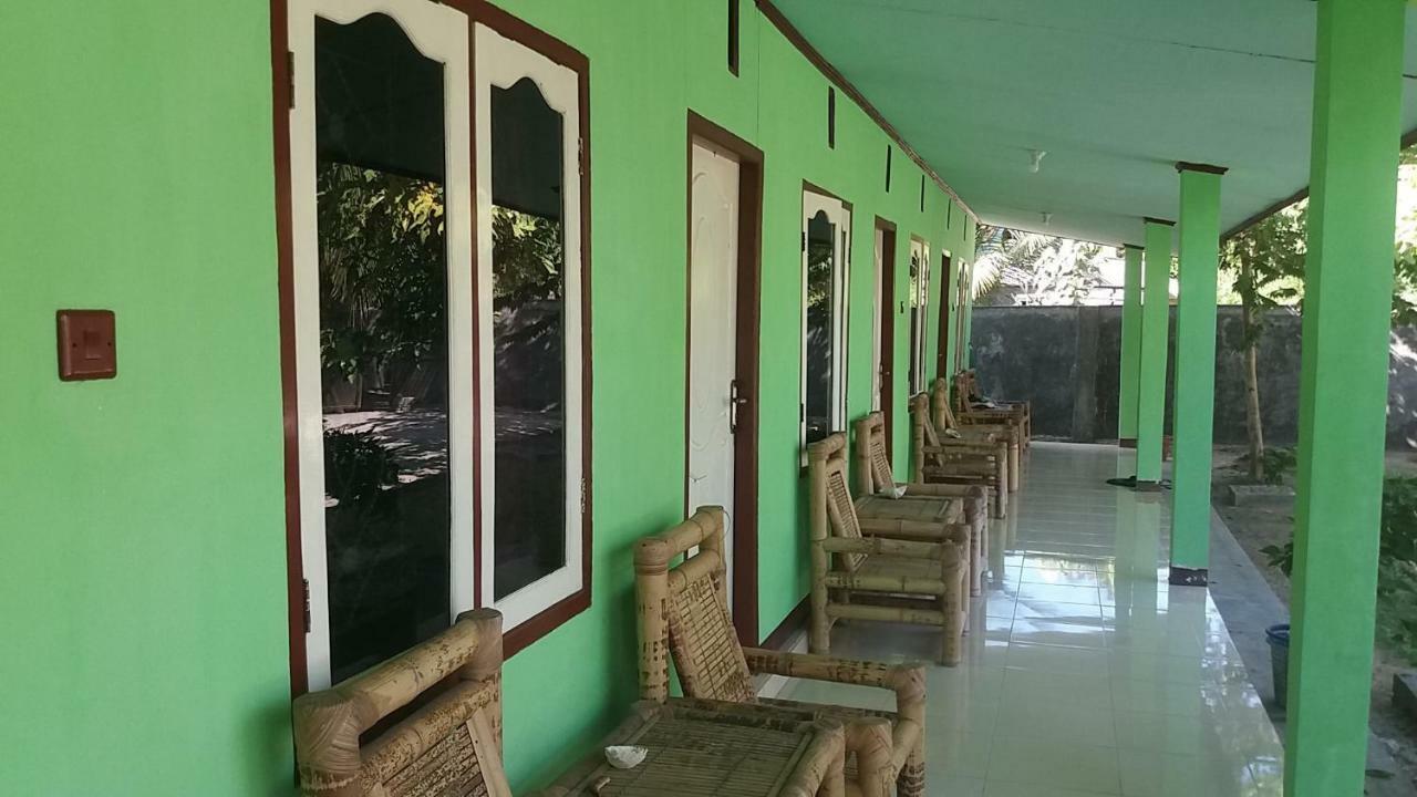 Ekas Beach Guesthouse Mitra Reddoorz Luaran gambar